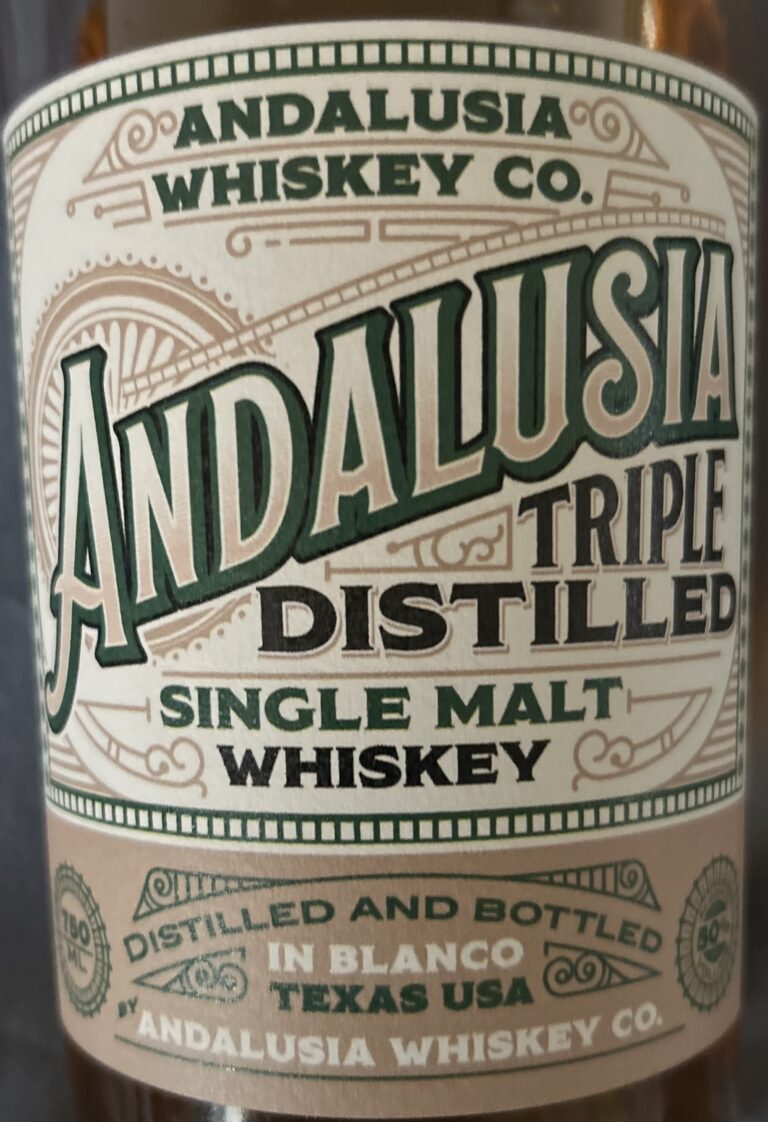 Andalusia Triple Distilled Texas Whiskey Bottle Label - the Kendall Gentleman Close-up of an Andalusia Triple Distilled Single Malt Whiskey Bottle Label, Highlighting Its Texas Origin and Crafted Quality.