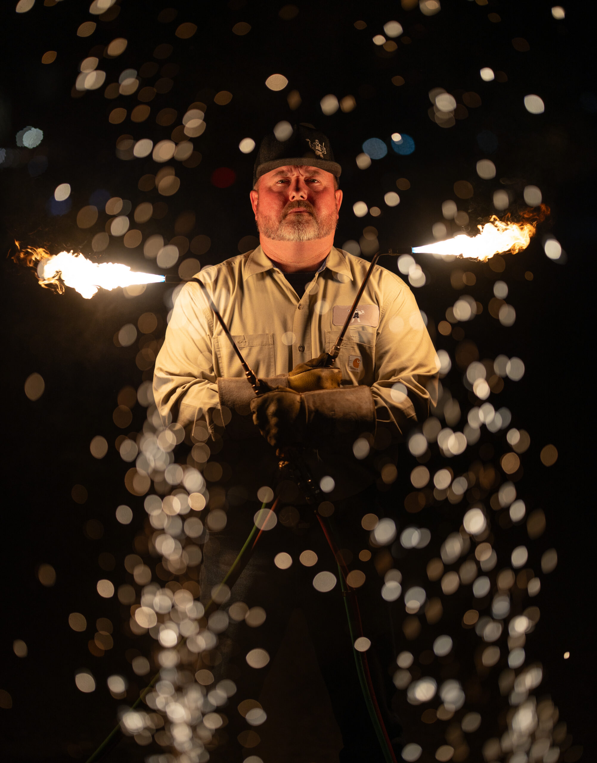 Dorman Vick, Featured in the May Issue of the Kendall Gentleman, Stands with Welding Torches Ablaze, Representing the Revival of Vocational Education in Texas.
