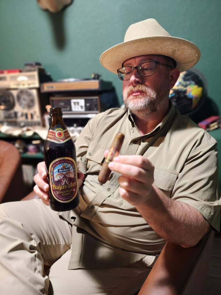 Clay Smoot, Cigar Reviewer for the Kendall Gentleman, Relaxes with a Bajuvator Doppelbock Beer and an Arturo Fuente Hemingway Short Story Cigar in Hand.
