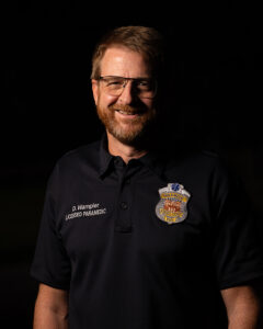 Dr. David Wampler, licensed paramedic and educator, photographed in uniform representing Hope for Heroes Texas.
