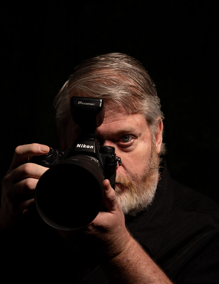 Portrait of Jason Abbott Holding a Nikon Camera, Former Boerne Police Officer and School Resource Officer.