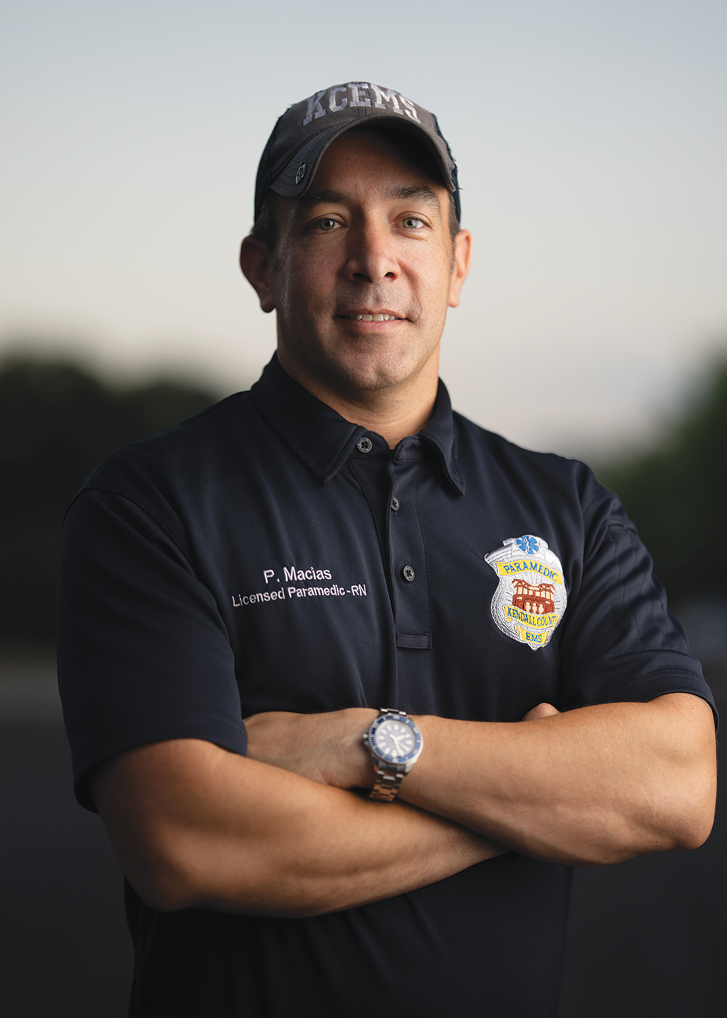 Pete Macias, Kendall County Ems Paramedic, in Uniform with Name Badge P. Macias Visible