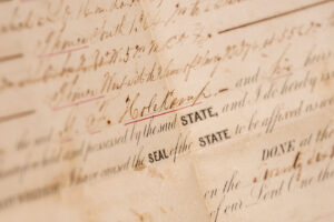 Scan of an Antique State of Texas Land Document with Ornate Lettering and a Seal