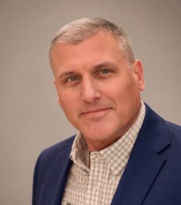 Dennis Postiglione in a Navy Blazer and Checked Shirt